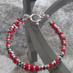  rings..nice Bracelet 7 Inches Sterling Silver and red and green plastic Deco.
