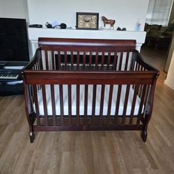 Delta Children's 4-in-1 Convertible Crib + Mattress