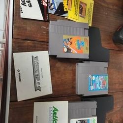 Various Nintendo games,manuals and materials. .
See pics