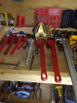 Different sizes of pipe wrenches