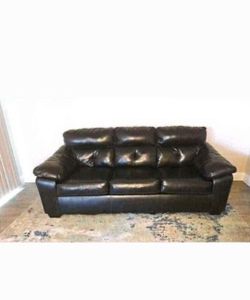 BLACK SOFA LEATHER WITH FREE RUG    MOVING SALE 10/26