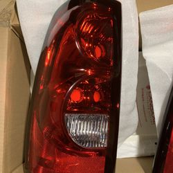 NEW Factory Chevrolet Tail Light Lens Assembly
