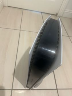 PlayStation 5 w/ Controller and backpack
