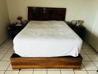 Queen bed with mattress. Two nightstands, 1 chest, 1 dresser with mirror