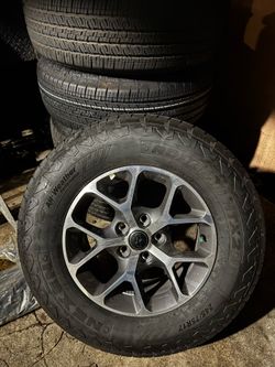 Jeep wrangler with extra spare tire and rim