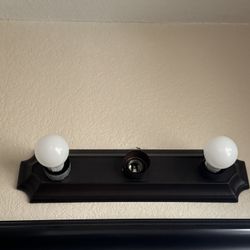 Two Bathroom light fixtures. 20$ OBO 