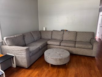 Gray sectional with ottoman