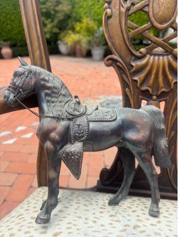 Vintage cast metal horse figurine