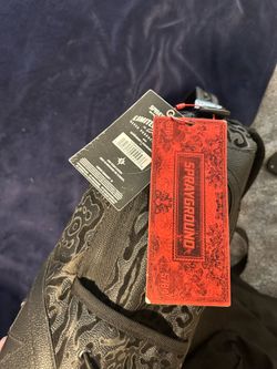 Black leopard spray ground bag - used