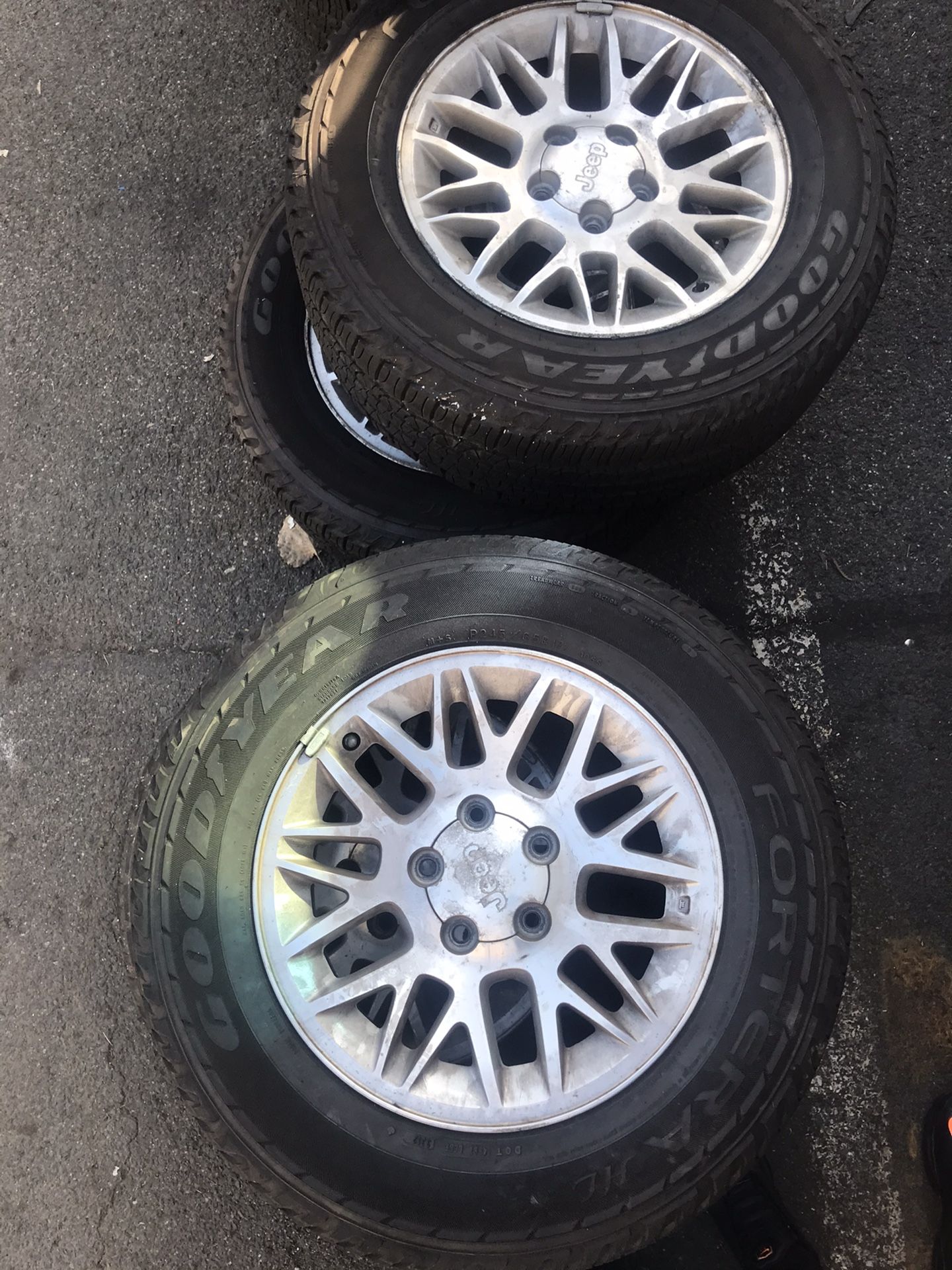 Jeep oem wheels with good tires.