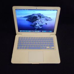 Macbook Unibody With Blue Protectice Case


