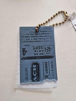 Coach Concert Ticket Keychain