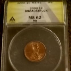 BROADSTRUCK ERROR PENNY, GRADED 62