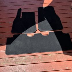 Tesla Model Y stock car mats.