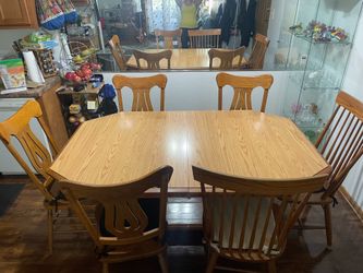 Dinner table with chairs