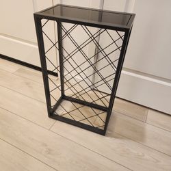 23 Bottle Black Wine Rack with Glass Top Shelf