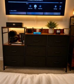 8-Drawer Rustic Wood and Metal Dresser with black fabric Shelves