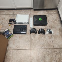 2 Old XBox And Old PS3 Consoles With Different Remote Controllers , Many Cords For Electronics 