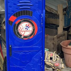 Yankees Locker With Bat, Ball Glove And Other Memorabilia 