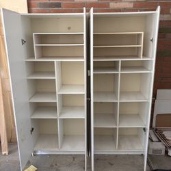 Two White Storage Cabinets 