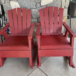 Red Wooden Rocking Chairs