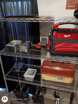 Rack full of tools/tackle box,, etc