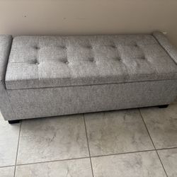 Tufted gray fabric storage bench  Gray Upholstered Storage Bench  Good condition  $200 Pick up in 77459 Missouri City