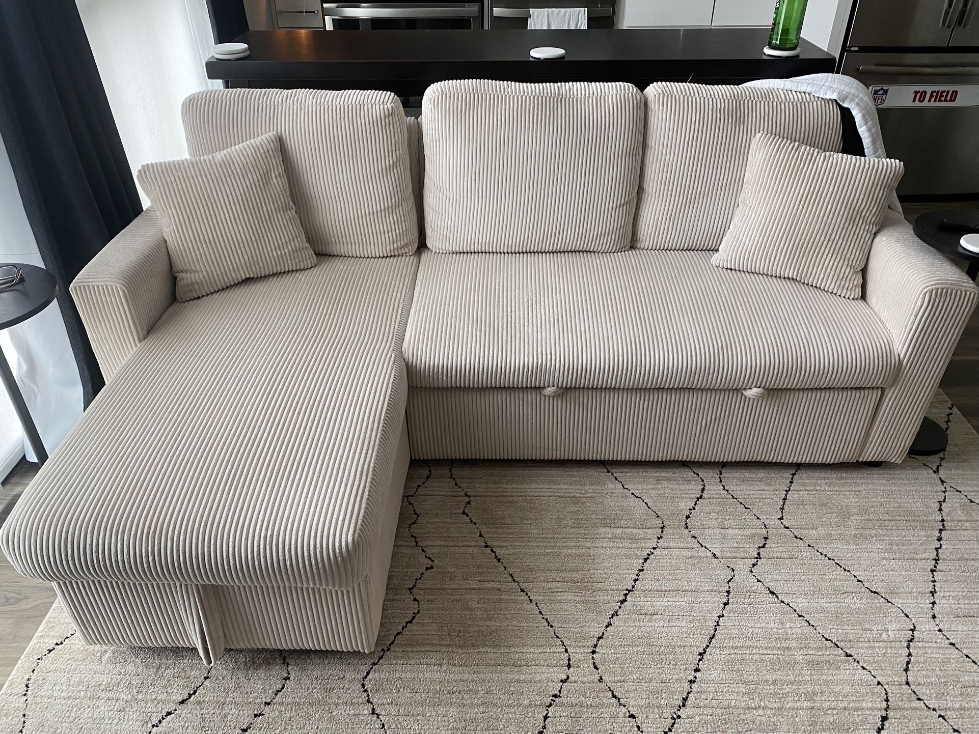 Modern 4 Seater Sofa With Hidden Footrest And Storage