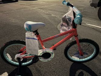 18” girl bike -new! (With helmet)