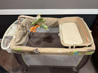 Carters Safari Pack N Play With Changing And Diaper Storage
