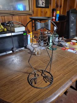 Skeleton plant stand or hold candy for Halloween.