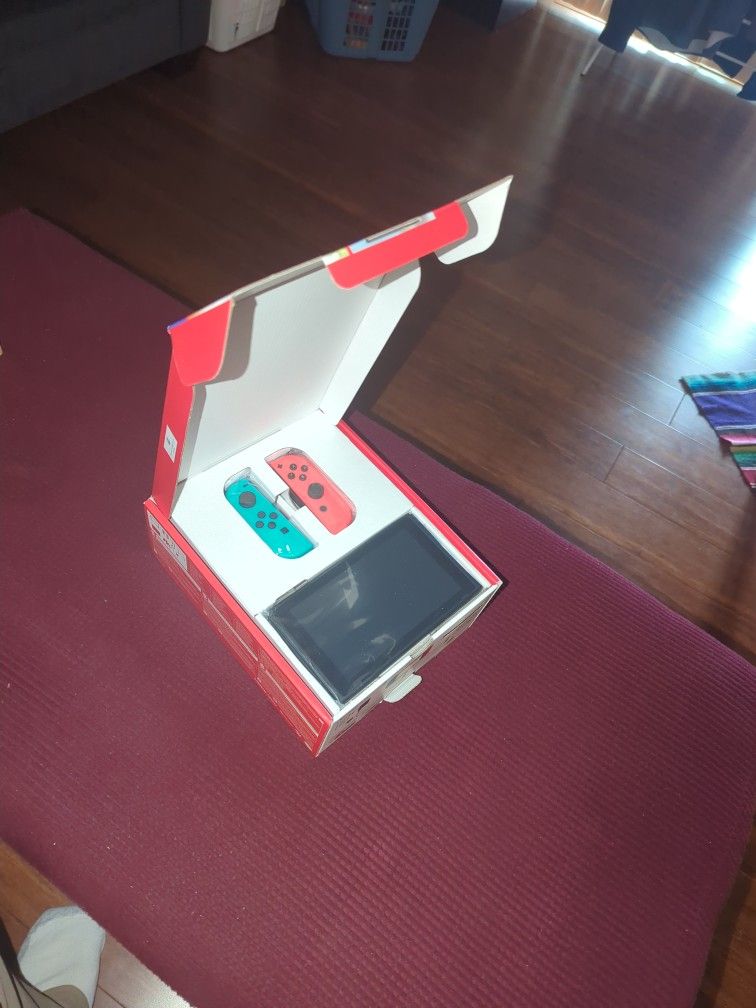 SALE PENDING. Nintendo Switch, Red Blue, New In Box, A Steal At $200! $300 value