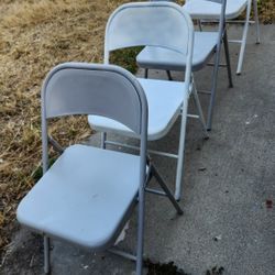 4 Folding Chairs 
