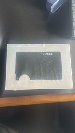Aluminum black sealed ridge wallet