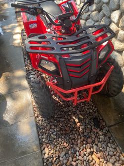 Red ATV Four Wheeler with Front Rack