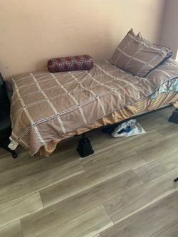 Twin bed, mattress and metal frame