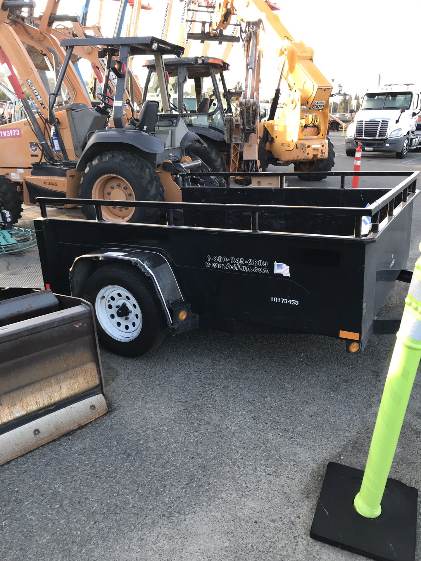 Utility trailer with ramp.
