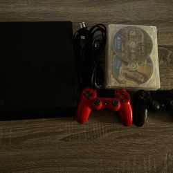 PS4 With Controllers And Games 