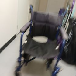 Lightly Used Wheelchair , Easy To Pull Or Roll. 