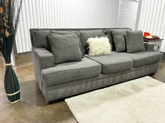 Ashley Furniture Signature By Design Sofa With Accent Nailhead Trim Including Delivery and Matching Pillows