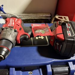 BRANDNEW M18 HAMMER DRILL AND BATTERY ONLY