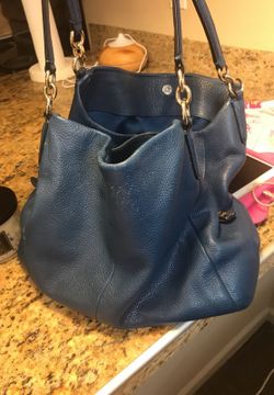 Coach purse blue 100% authentic and have had it for out a year