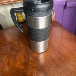 The product in the image is a Copco brand insulated travel mug.