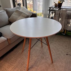 White table and two chairs
