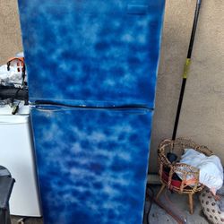 REFRIGERATOR LIKE NEW FROM A FIRE DAMAGED HOUSE THATS WHY THE BLUE PAINT