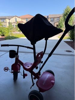 Radio Flyer toddler tricycle with push handle + canopy