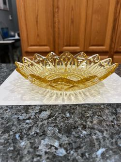 Vintage Amber Glass Plate.  Size 8 inches wide and 2 inches depth.  Preowned Excellent condition no cracks or chips.  Has been on display in a cabinet