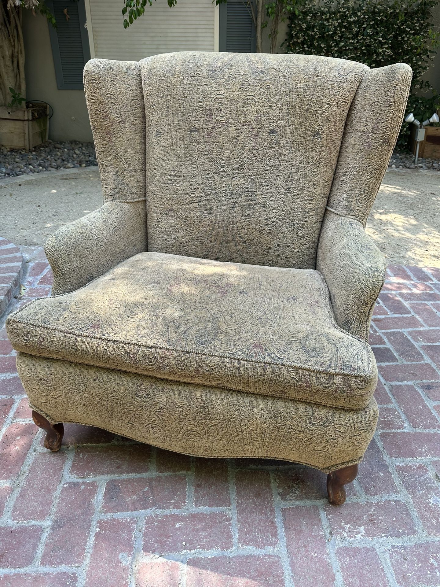 1950s oversized wing back armchair with ottoman matching