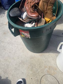 Bin of women's shoes and boots mix