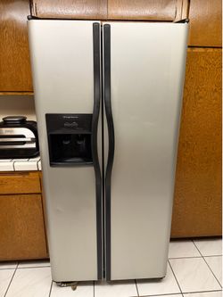 Frigidaire Silver Side by Side Refrigerator Freezer-Used